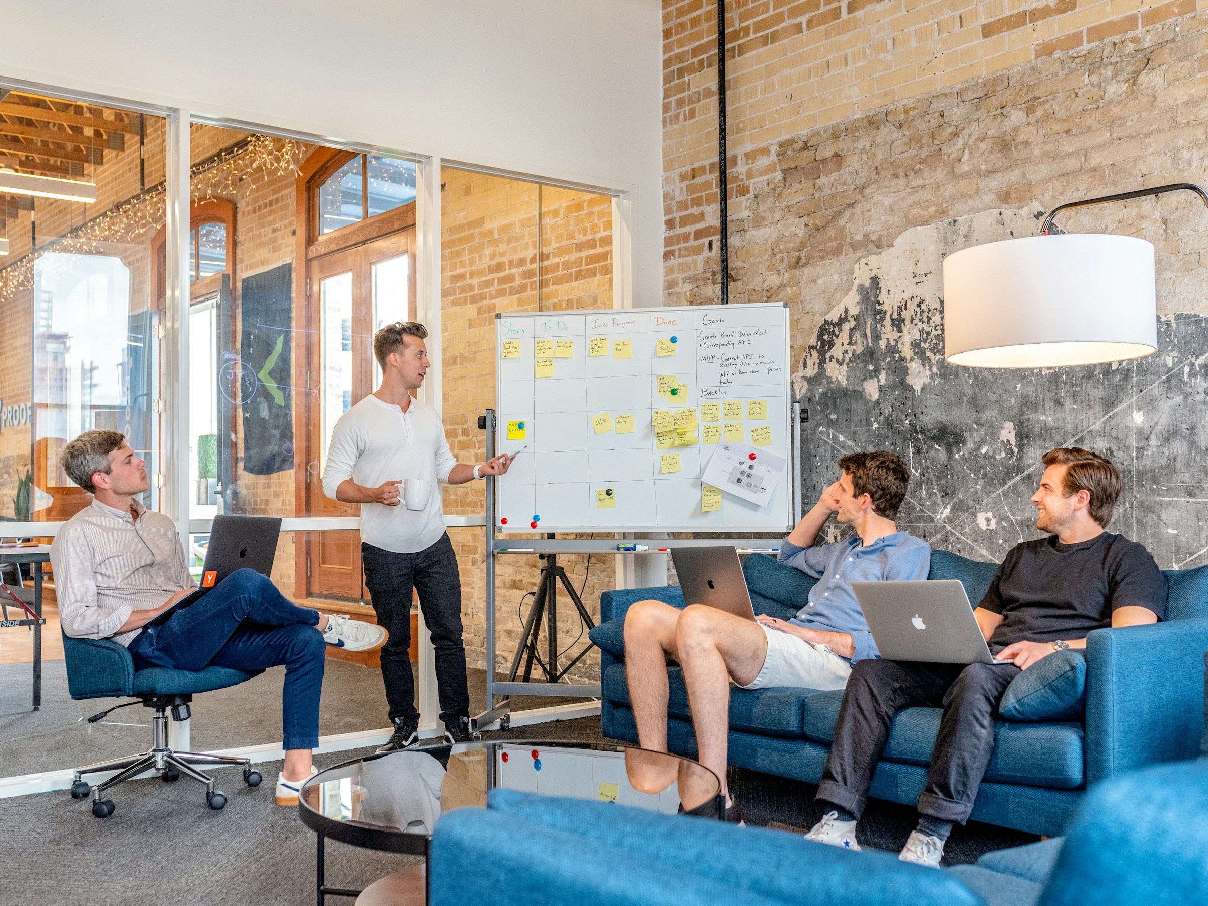 employees in a meeting - Corporate Video Production Prices