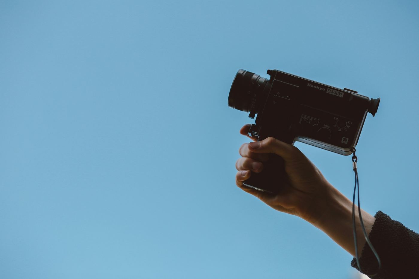 Person Holding Camera - Corporate Video Script