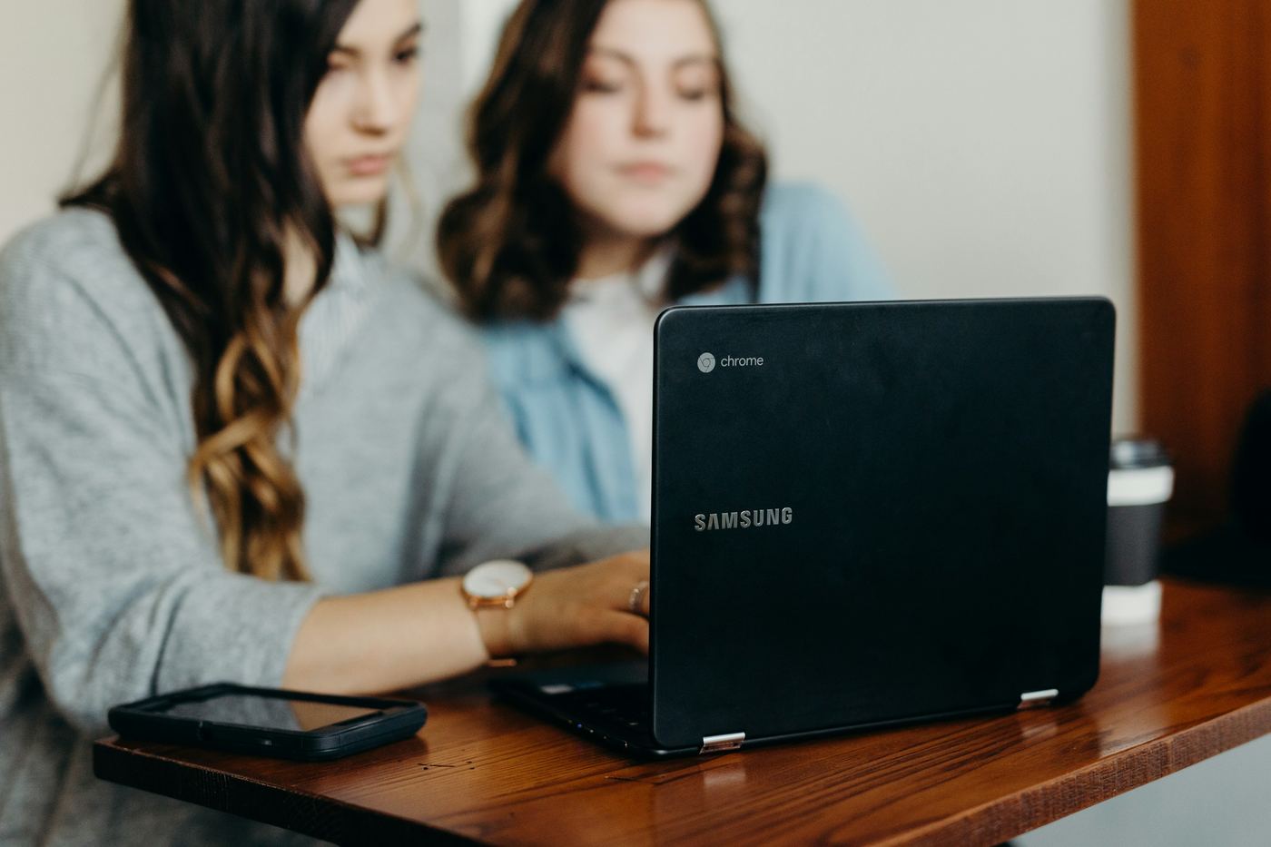 students on a laptop - Video Production Cost 