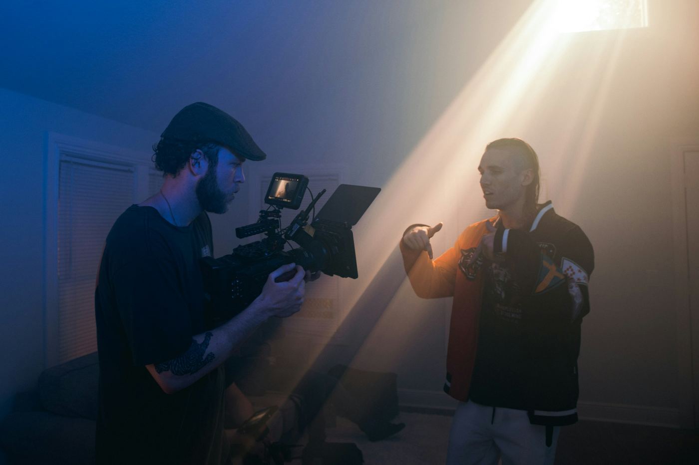 man recording with a camera - Video Production Cost 