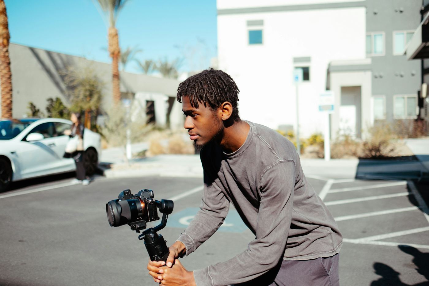 Man Filming How Much Does Video Editing Cost