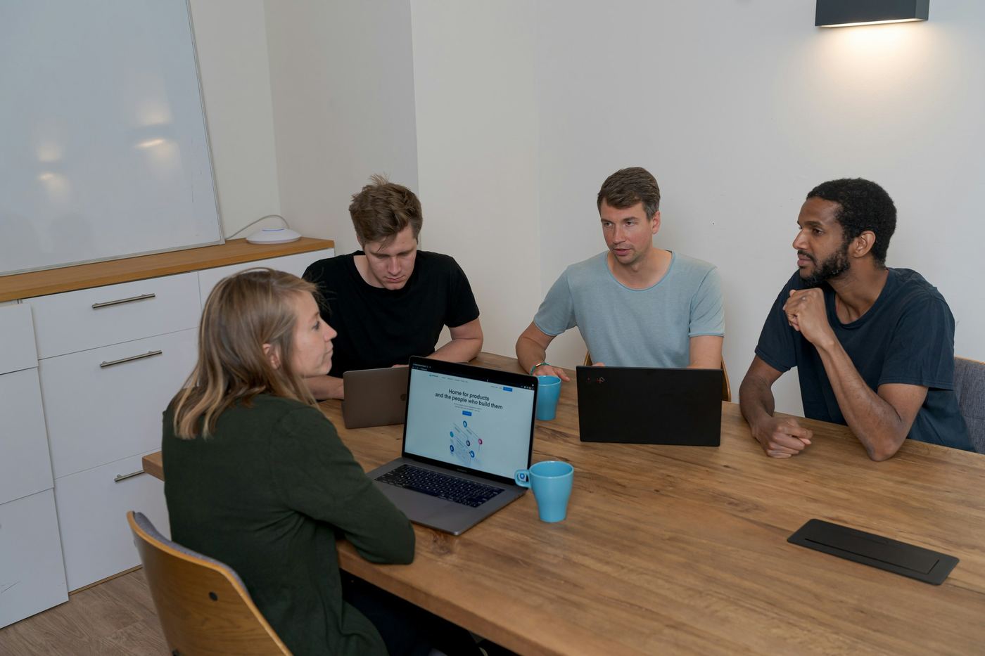 employees on a laptop - Top Explainer Video Companies