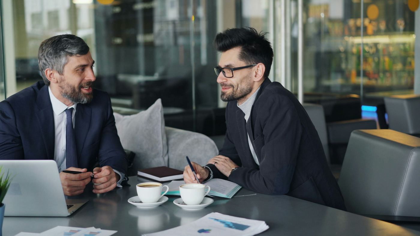 employees talking - How to Create Training Modules