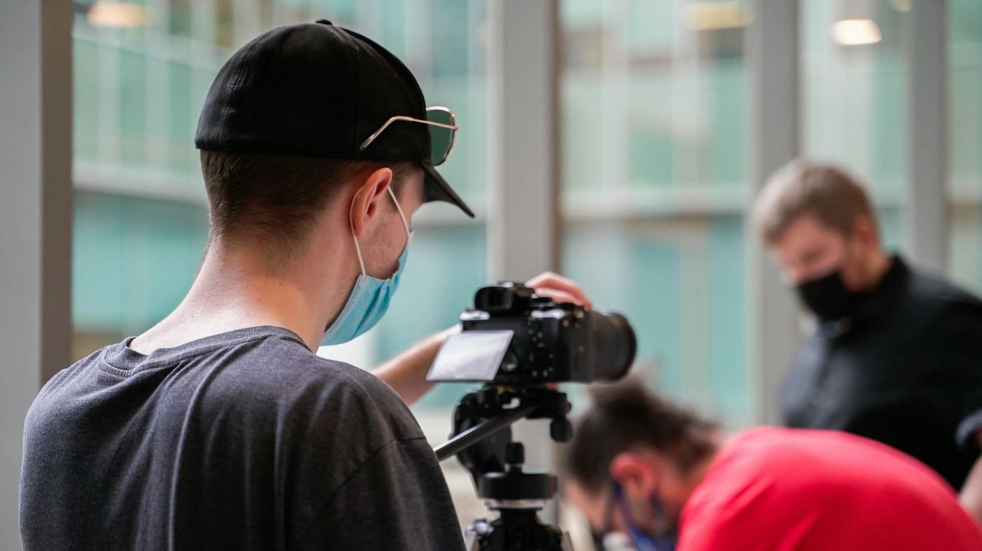 man making a video - Types of Corporate Videos