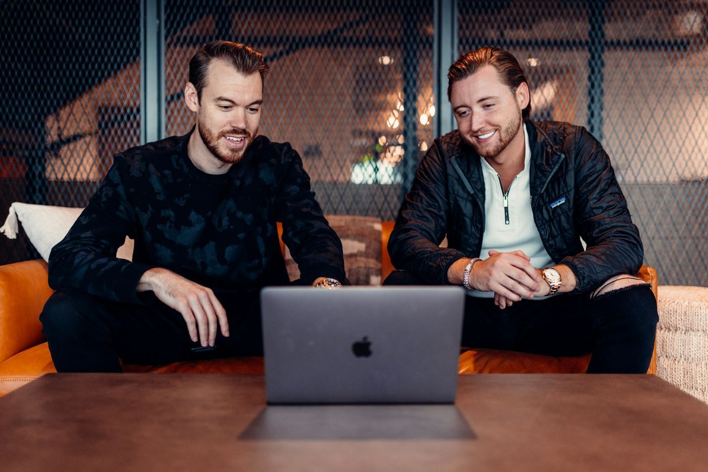 men using a laptop - Customer Education Strategy
