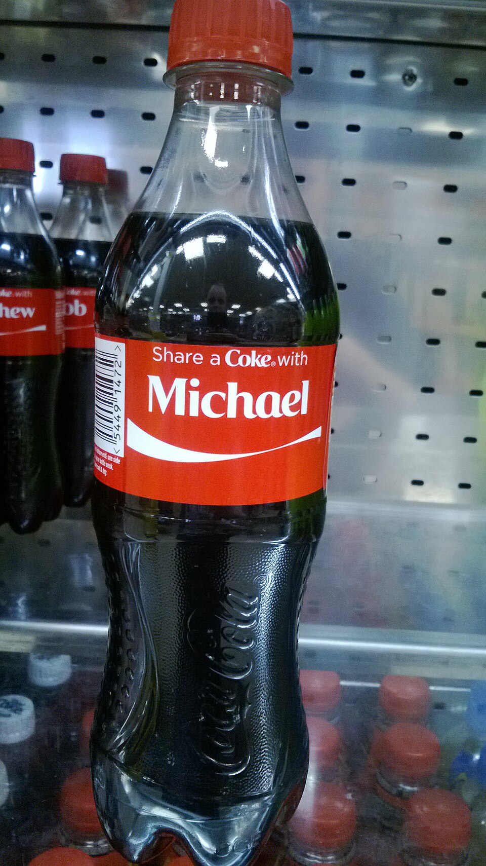 A Coca-Cola bottle from the Share a Coke campaign with a first name printed on the label in place of the logo