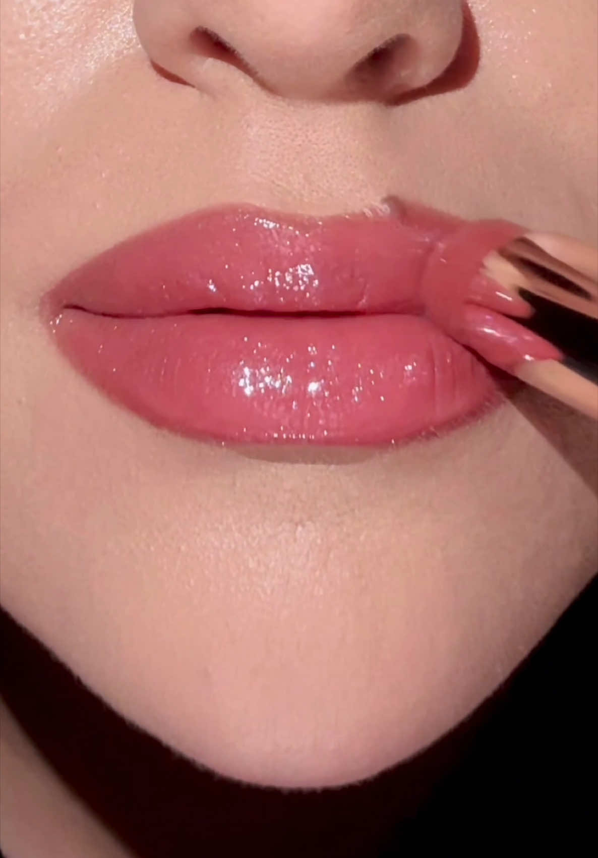 A Fenty Beauty TikTok post showing a creator swatching four shades of a lip product