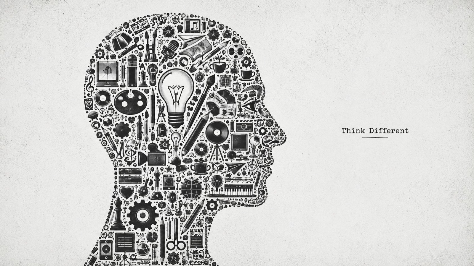 A silhouette of a human head constructed from various creative tools, icons, and artistic objects on paper.