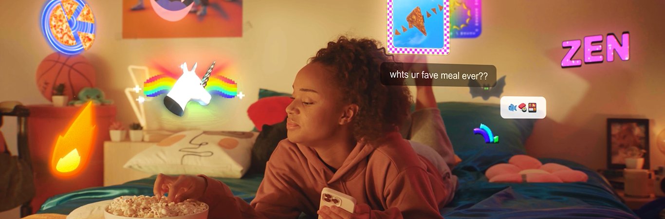 A young woman lying on a bed in a neon-lit bedroom, with a chat bubble reading whts ur fave meal ever and neon stickers around her
